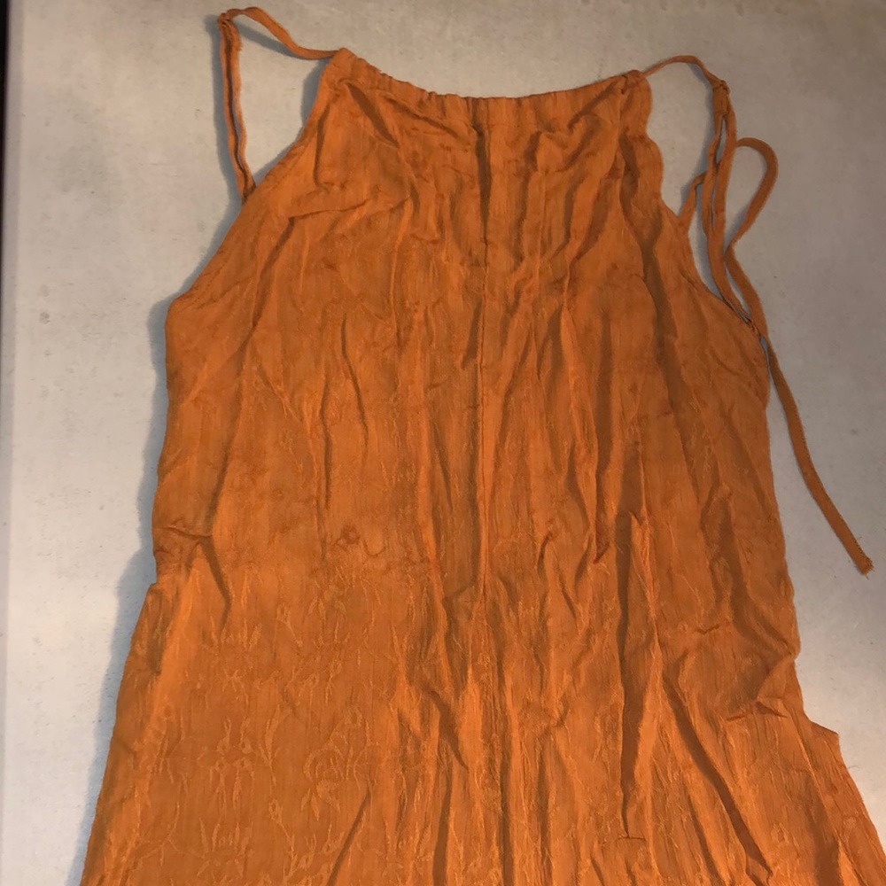 Burnt orange jumpsuit, open back